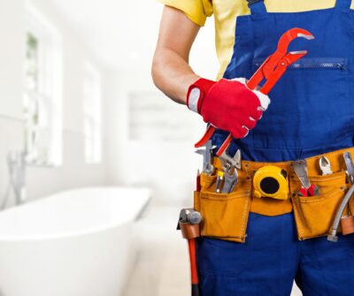 Plumber installing a kitchen sink – Plumbing installations in London