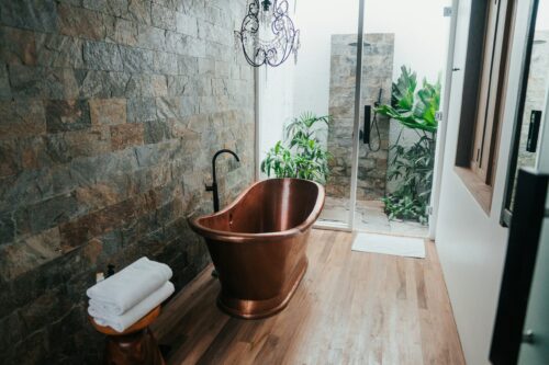 Professional plumber performing shower repairs in London, ensuring leak-free and efficient operation.